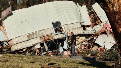 A damaged trailer home in Mount Vernon. Officials said there were six deaths across the state. EPA