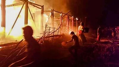 A Unicef learning centre burning down in an arson attack, at a Rohingya camp in Bangladesh's southeastern district of Cox's Bazar. AFP