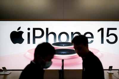 An Apple iPhone 15 advertisement is seen as it officially went on sale across China at an Apple Store in Shanghai. Reuters