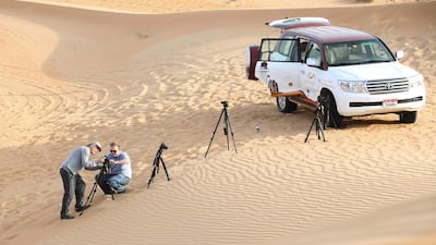 Bill Fontana in Liwa Desert making his sound recordings for Abu Dhabi Festival. Courtesy Abu Dhabi Festival