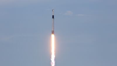 A SpaceX Falcon 9 rocket blasts off into space. AFP