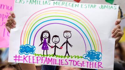 Protest sign during a rally at the US-Mexico border in San Diego, California. David Maung / EPA