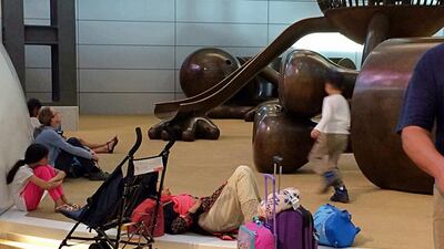 Hours later Qatar Airways announced it had suspended all flights to Saudi, the UAE, Bahrain and Egypt. Hadi Mizban / AP Photo