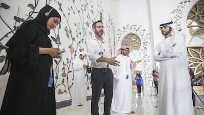 For the flowers, Mr Dean selected irises, lilies, poppies, tulips, roses, jasmines and passifloras. Mona Al Marzooqi / The National