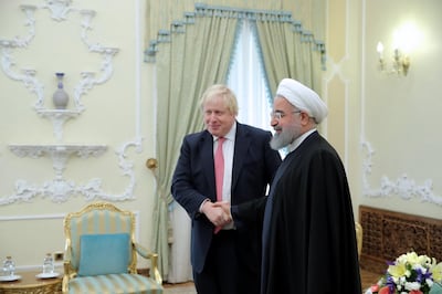 Iranian president Hassan Rouhani (R) greets British Foreign Secretary Boris Johnson at the presidential office in Tehran, Iran, 10 December 2017, where the two discussed the case of Nazanin Zaghari-Ratcliffe and other dual citizens jailed in Iran. EPA/Presidential Office Handout