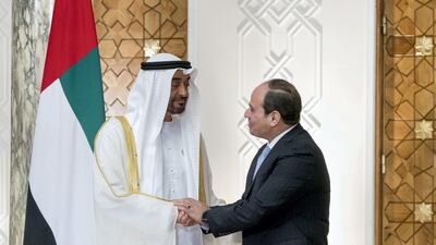 Sheikh Mohammed bin Zayed, Crown Prince of Abu Dhabi and Deputy Supreme Commander of the UAE Armed Forces (L), greets Abdel Fattah El Sisi, President of Egypt (R), at Heliopolis Palace, during an official visit. Rashed Al Mansoori / Crown Prince Court - Abu Dhabi