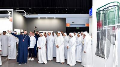 Sheikh Hamdan tours the exhibit.