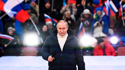 Russian President Vladimir Putin addresses crowds at a concert in Moscow to mark the eighth anniversary of the annexation of Crimea. AP