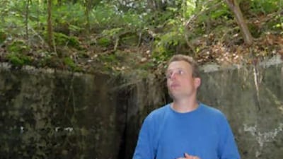 Sebastian Schöne of the environment group Bund, inspects a Siegfried Line bunker in a forest south-west of Cologne, Germany.