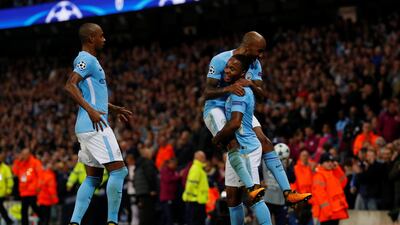 Manchester City's Raheem Sterling celebrates with Fabian Delph and Fernandinho after scoring Manchester City's second goal. Phil Noble / Reuters