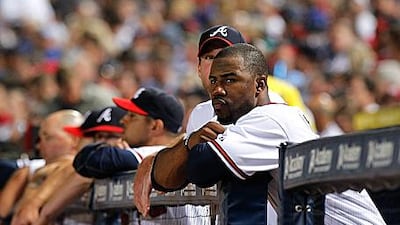 Jason Heyward follows the action from the Braves' dugout at Turner Field in Atlanta.
