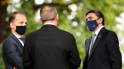 Sheikh Abdullah bin Zayed and his Israeli counterpart Gabi Ashkenazi welcome each other watched by German Foreign Minister Heiko Maas before their historic meeting at Villa Borsig in Berlin, Germany. Reuters