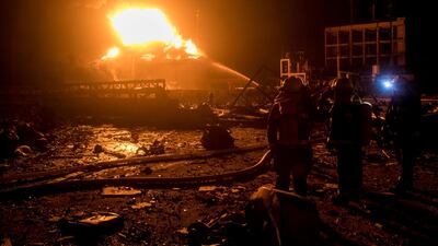 Firefighters work on extinguishing the fire following the explosion. Reuters