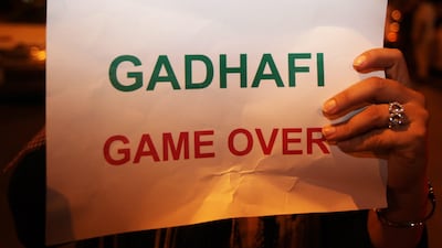 epa02874783 Thousands of people, mostly Libyans, gather outside the Libyan Embassy in Tunis, Tunisia on 21 August 2011, where the insurgents' flag was hoisted on the roof of the building. Explosions and heavy gunfire were heard late on 20 August in Tripoli, Libya, with rebels saying they were advancing into the capital as Libyan leader Moammer Gaddafi‘s regime crumbled. Rebels said that demonstrators took to the streets after sunset across the capital. Shortly after, sounds of explosions rocked the city in what rebels said was a 'planned uprising' by opposition supporters there. EPA/STR *** Local Caption *** 02874783.jpg