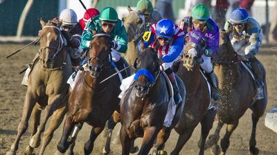 Bayern (4, red, white & blue silks) will be among the American runners who have committed to run at the Dubai World Cup Carnival. Scott Serio / AP Images