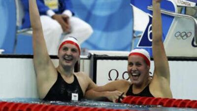 Rebecca Adlington, left, of Great Britain celebrates winning the women's 400 meters freestyle swimming final with compatriot Joanne Jackson, who finished third.