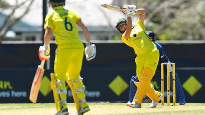Ashleigh Gardner of Australia hits a six to reach her fifty on Sunday. Getty