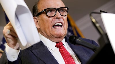 Singer-songwriter Robin Thicke and actor Ken Jeong left in protest after the former New York City mayor was unmasked. Reuters