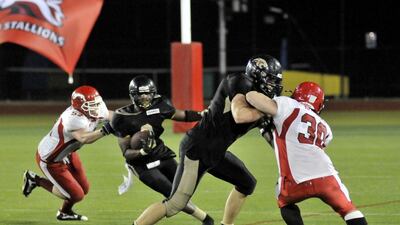 Vivaldi Tulysse, second from right, was named the Desert Bowl's most valuable player on Friday night. Charles Crowell for The National / March 14, 2014