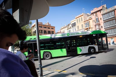 A bus powered by green hydrogen carries passengers in the city of Palma, Mallorca. AFP