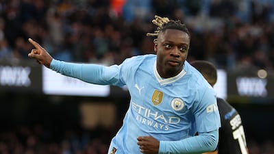 Jeremy Doku of Manchester City celebrates scoring his team's fifth goal against Huddersfield Town. Getty Images