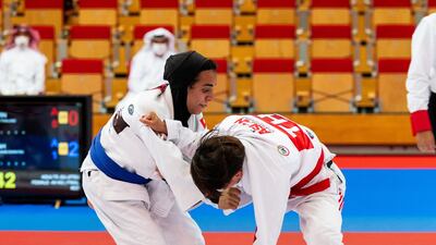 Hamdah Al Shikeili, left, defeated Thai Tadaporn Sakaew at the Jiu-Jitsu Asian Championships in Abu Dhabi. Courtesy UAEJJF