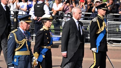 From left, King Charles, Princess Anne, Prince Andrew and Prince Edward walk behind the coffin during the procession for the lying-in-state of Queen Elizabeth II in London in 2022
