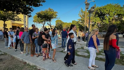 Cubans queue to enter the embassy. AFP