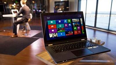 Lenovo's Yoga laptop screen can be flipped. David Paul Morris / Bloomberg News
