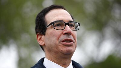 Treasury Secretary Steve Mnuchin speaking to reporters on Saturday. On Sunday, he said the stimulus package the government had agreed should provide support to workers and businesses for eight to 10 weeks. AP Photo