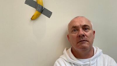 Artist Damien Hirst with a version of Maurizio Cattelan's work recreated by Francesco Bonami. Via @damienhirst / Instagram