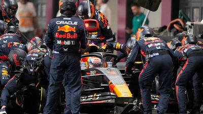 Max Verstappen makes a pit stop. AFP
