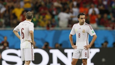 Spain's Xavi, right, during the defeat to the Netherlands on June 13, 2014. EPA