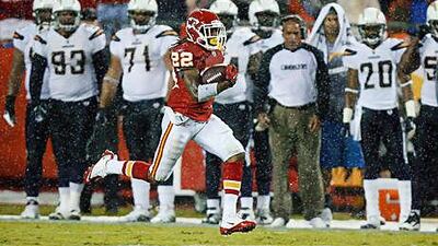 The San Diego Chargers look on as Kansas City's Dexter McCluster runs for 94 yards and a touchdown on a punt return.