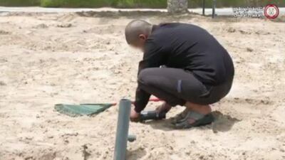 The motorist was made to replant the grass and flowerbed as a penalty. Courtesy: Abu Dhabi Police