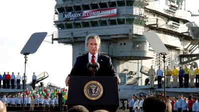 President George W Bush declares the end of major combat in Iraq aboard the aircraft carrier USS Abraham Lincoln off the California coast on May 1, 2003. J. Scott Applewhite / AP Photo
