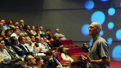Personal finance author Andrew Hallam giving a talk to investors at Cranleigh School in Abu Dhabi last year. The writer is returning to the UAE later this month following the publication of his latest book - Millionaire Expat: How to Build Wealth Living Overseas. Satish Kumar / The National