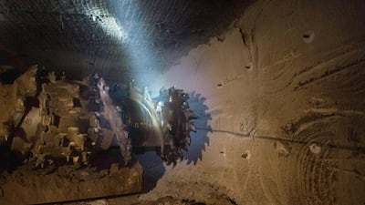 Remotely controlled rock-cutting machines with tungsten carbide-tipped cutting teeth at the Boulby potash mine. Ian Forsyth / Getty Images