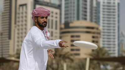 Ahmed Al Shamisi shows off his Ultimate throwing skills in Dubai. Antonie Robertson / The National