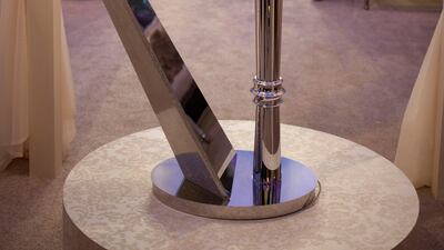 A floor lamp in the shape of a harp made with Morano glass and a chrome finish is worth US$10,000. Razan Alzayani / The National