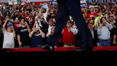 US President Donald Trump walks on stage in Cape Girardeau, Missouri. Reuters