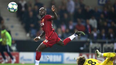 Sadio Mane on his way to scoring Liverpool's third goal. AP Photo