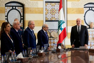 Lebanese President Joseph Aoun, Prime Minister Nawaf Salam and members of the cabinet attend a session to discuss the army's plan to disarm Hezbollah. Reuters