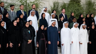 President Sheikh Mohamed with members of the UAE pavilion team. Photo: UAE Presidential Court