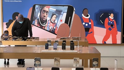 Apple shipped a record 237.9 million iPhones in 2021, which was more than 17 per cent of total global shipments, Counterpoint Research reported. AFP