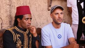 Mohamed Ramadan, left, with director Mohamed Diab on the set of Asad. Photo: Mohamed Diab