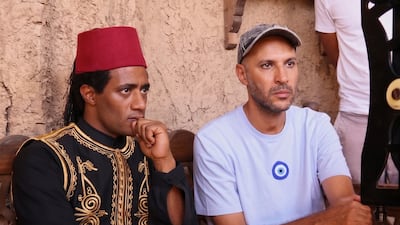 Mohamed Ramadan, left, with director Mohamed Diab on the set of Asad. Photo: Mohamed Diab