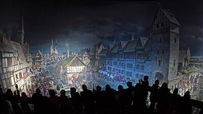 Visitors at a private viewing look at the artist Yadegar Asisi’s new 360-degree panorama painting depicting events from the reformation in Wittenberg, Germany. A special building was constructed in Wittenberg, the town in which Luther supposedly posted his 95 theses on the door of the All Saints’ Church in 1517, to house the painting due its size. Hendrik Schmidt / EPA