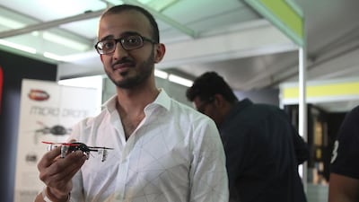 Fahed Abdullah, a Saudi Arabian visitor to the Big Boys Toys exhibition in Dubai, holds a Micro Drone 2.0. “There are interesting products here, but it’s as if there is no specific target audience,” he says. Lee Hoagland / The National
