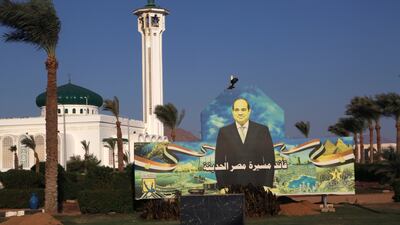A billboard shows Egyptian President Abdel Fattah el-Sissi ahead of this year’s United Nations global summit on climate change, known as COP27, along Peace Road, in Sharm el-Sheikh, South Sinai, Egypt. When world leaders, diplomats, campaigners and scientists descend on Sharm el-Sheikh in Egypt for talks on tackling climate change, don't expect them to part the Red Sea or perform other miracles that would make huge steps in curbing global warming. AP Photo
